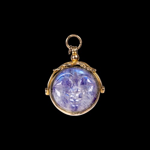A 1920 gold and labradorite swivel pendant. Man in the moon